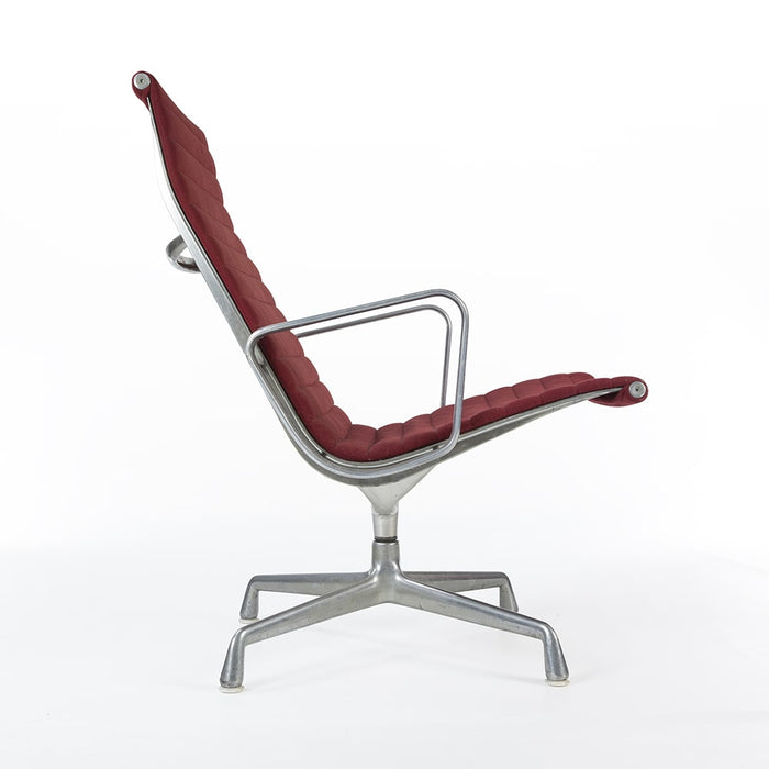 Right side view of red Eames EA316 aluminium lounge chair