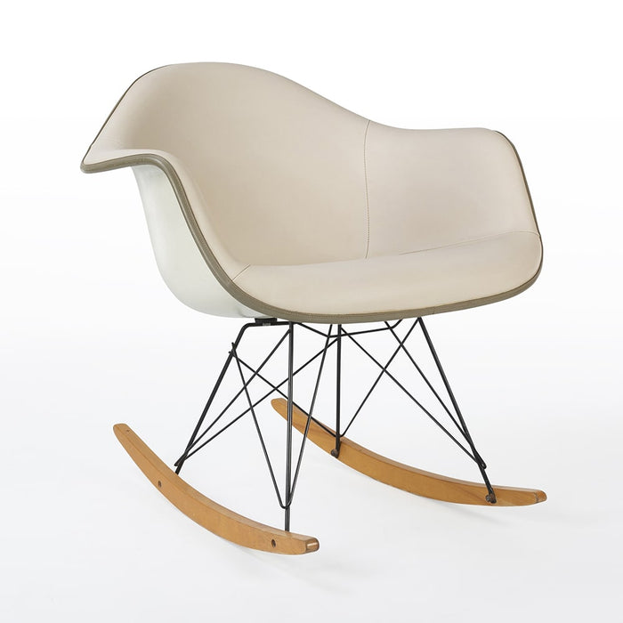 Front angled view of all white Eames RAR rocking arm chair