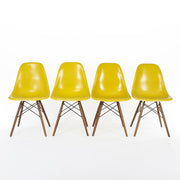 Front view of set of 4 Yellow Eames DSWs in a line