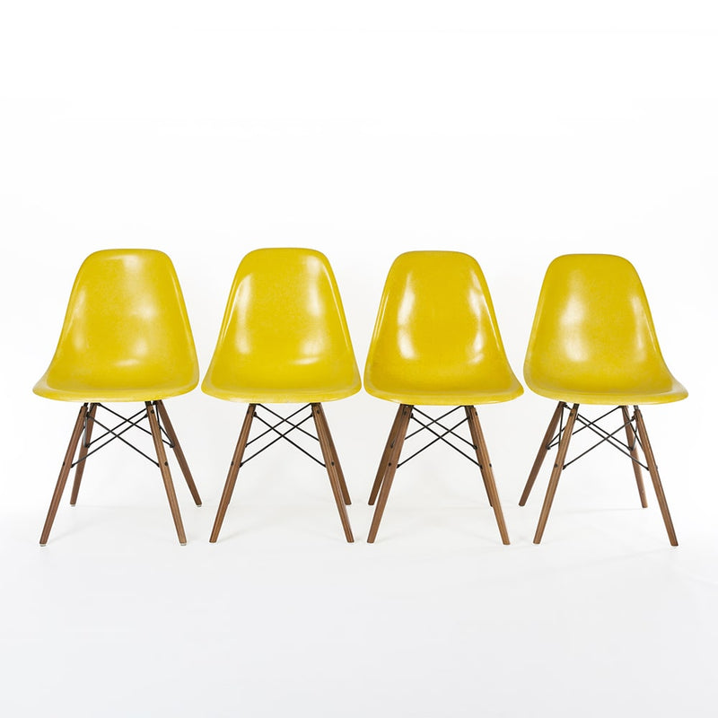 Front view of set of 4 Yellow Eames DSWs in a line