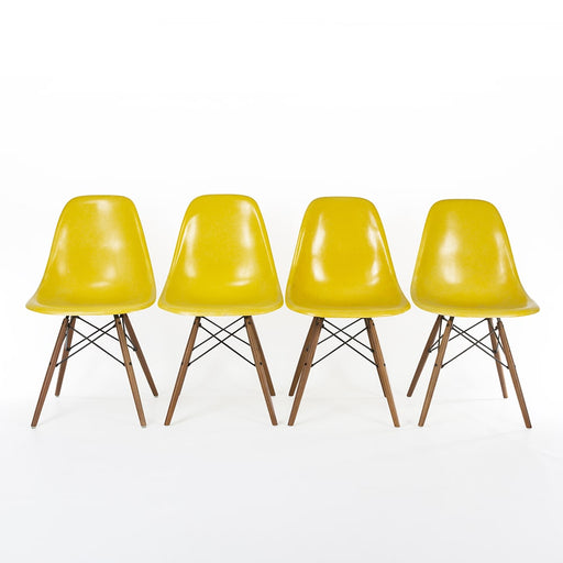 Front view of set of 4 Bright Yellow Eames DSWs in a line