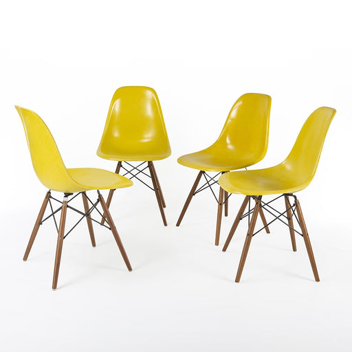 Front view of set of 4 Bright Yellow Eames DSWs in a circle