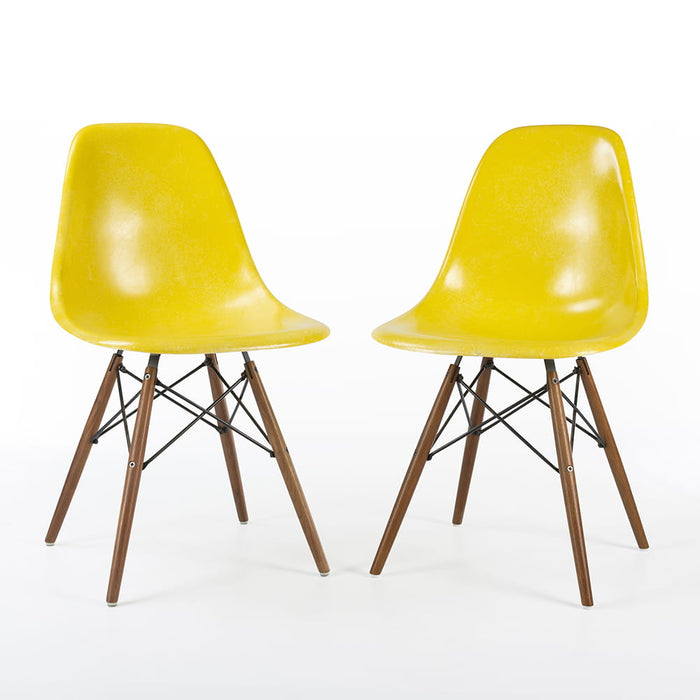 Front angled view of pair of Bright Yellow Eames DSW dining side chairs
