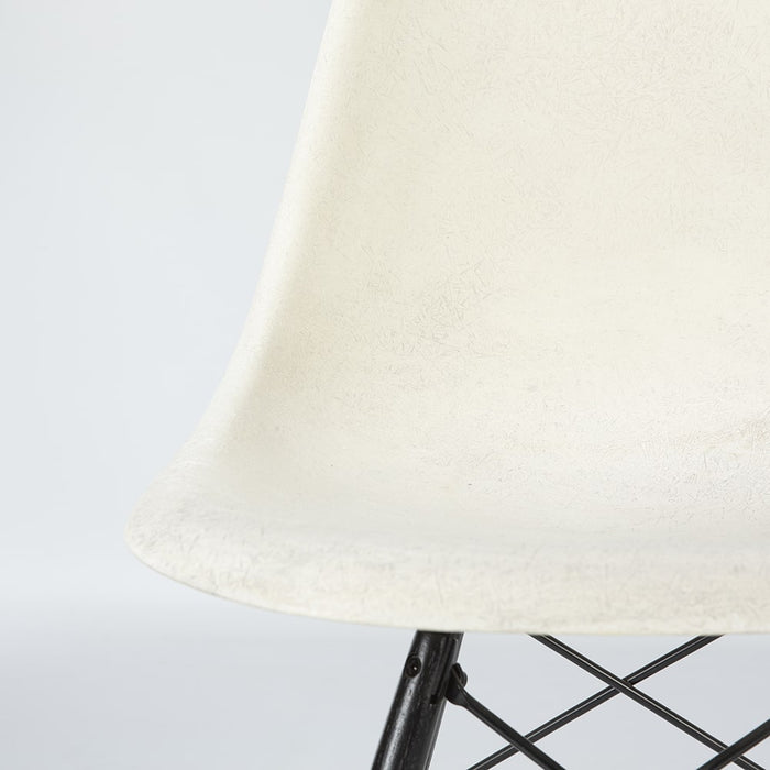 Partial front view of white Eames DSW