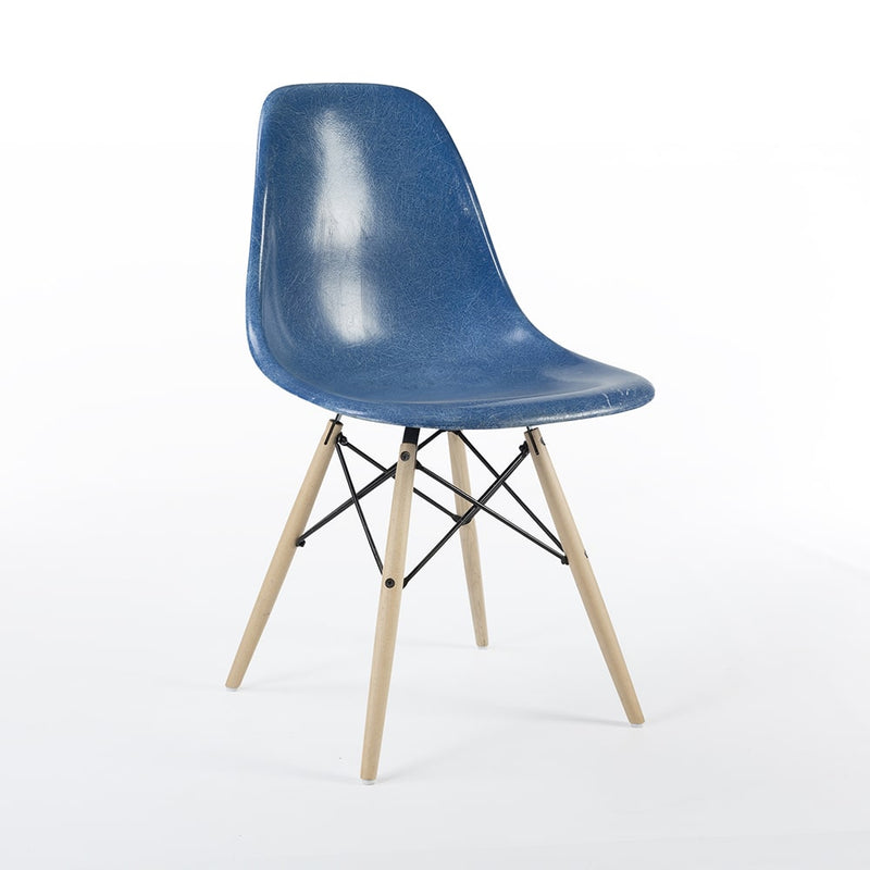 Front angled view of blue Eames DSW dining side chair