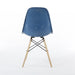 Rear view of blue Eames DSW dining side chair
