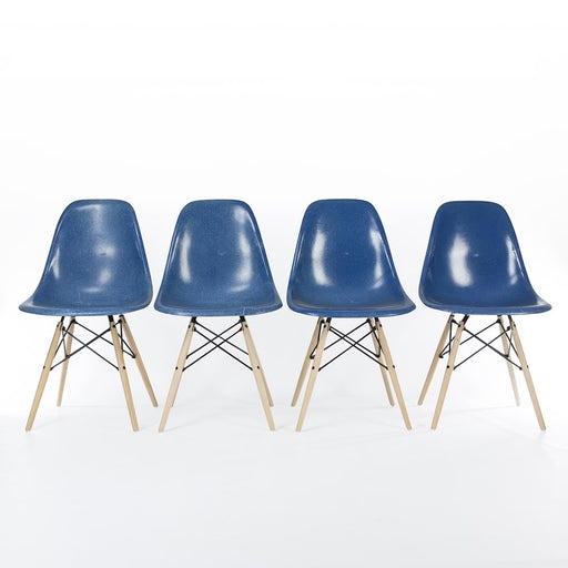 Front view of set of 4 blue Eames DSW dining side chairs