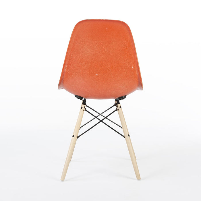 Rear view of orange Eames DSW dining side chair