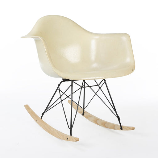 Front angled view of parchment Eames RAR rockling chair