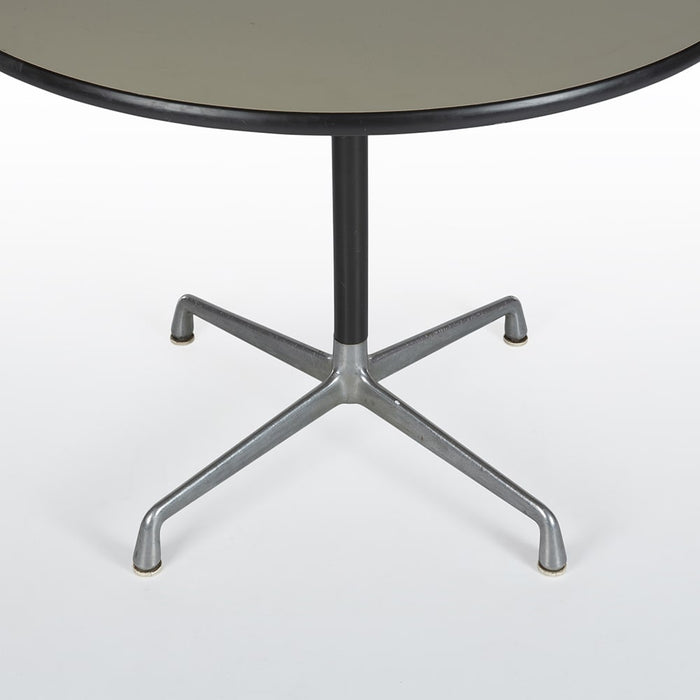 Angled view of Base on Eames ET102 White Universal Dining Table