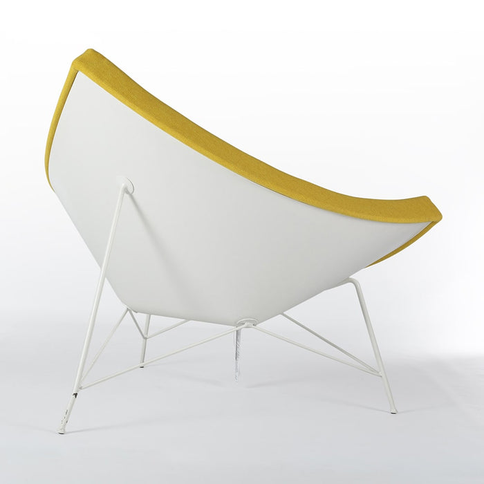 Rear angled view of orange on white Nelson coconut chair