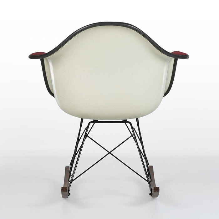 Rear view of red fabric Eames RAR rocking arm chair