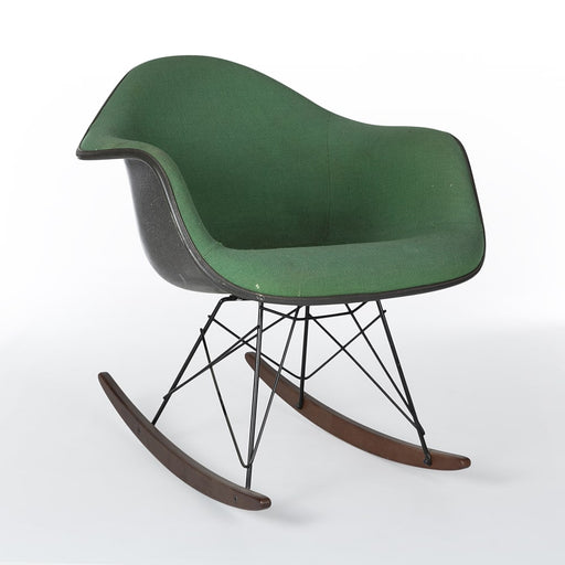 Front angled view of green on black Eames RAR rocking arm chair