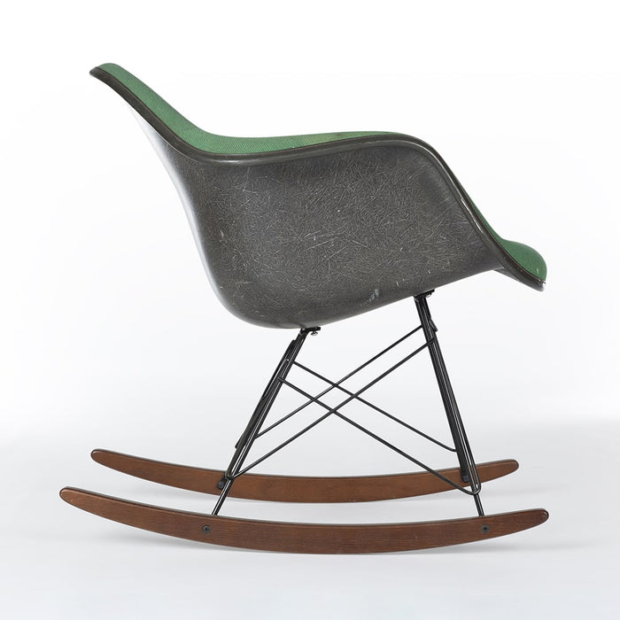 Right side view of green on black Eames RAR rocking arm chair