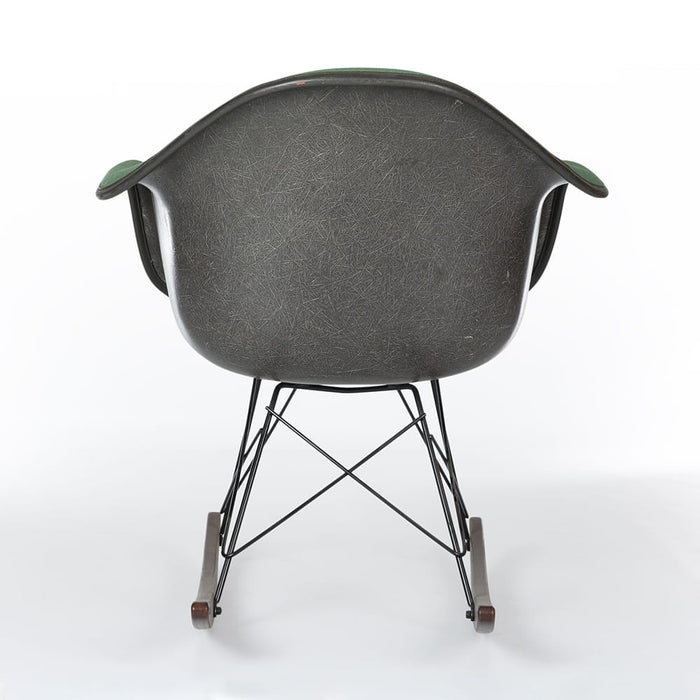 Rear view of green on black Eames RAR rocking arm chair