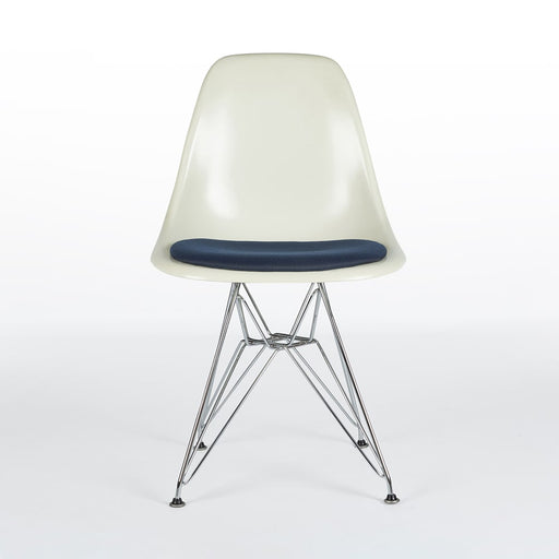 Front view of white and blue Eames DFSR dining side chair