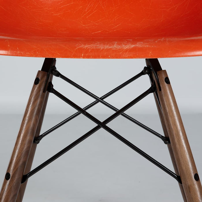 View of base on orange Eames DSW