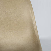 Partial, close up view of greige Eames DSW