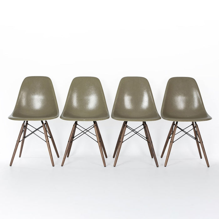 Front view of set of 4 raw umber Eames DSW dining side chairs in a line