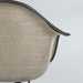 Close up rear view of red vinyl Eames RAR rocking arm chair