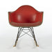 Front view of red vinyl Eames RAR rocking arm chair
