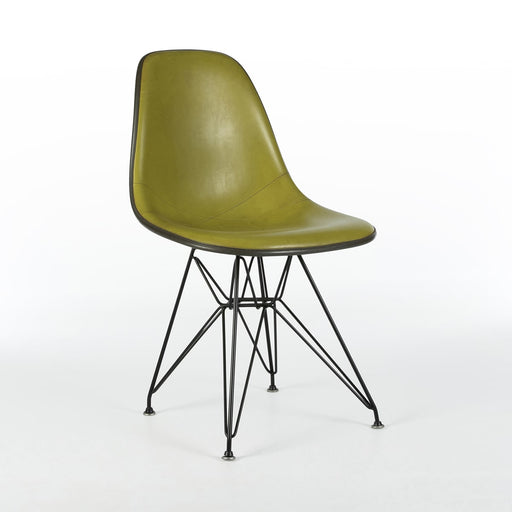 Front angled view of green vinyl Eames DSR