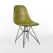Front angled view of green vinyl Eames DSR