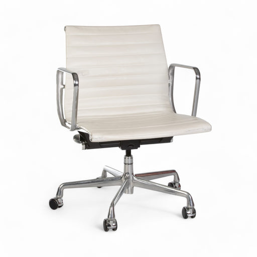 Front angled view of white Eames EA335 office chair