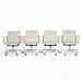 View of set of 4 white Eames EA335 office chairs in a line