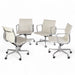 View of set of 4 white Eames EA335 office chairs in a circle