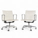 Front angled view of pair of white Eames EA335 office chairs