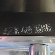 View of label on black Eames EA337