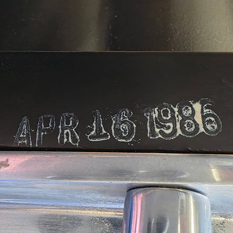 View of label on black Eames EA337