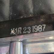 View of date stamp on navy blue Eames EA337