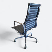 Angled left side view of navy blue Eames EA337