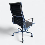 Rear angled view of navy blue Eames EA337