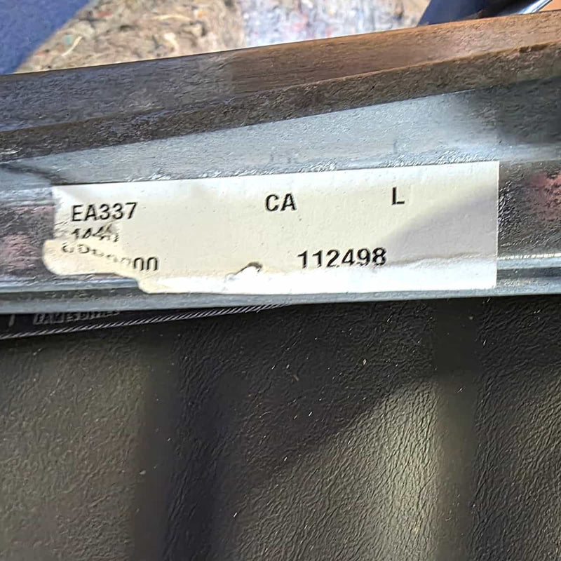 View of label on Grey Eames EA337 High Back Ribbed Office Chair