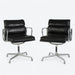 Front view of pair of black Eames EA408S chairs