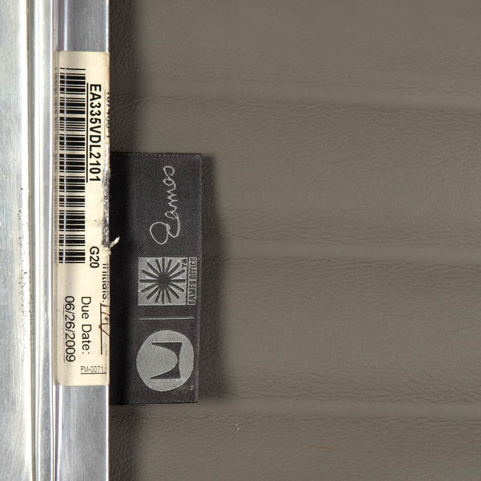 View of label on light grey Eames EA335