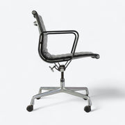 Right side view of black Eames EA318 office chair