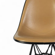 Artistic front view of beige Eames DSR