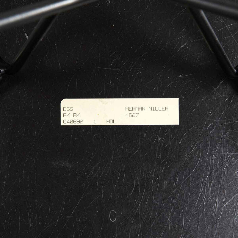 View of label on beige Eames DSR