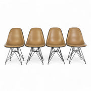 Front view of set of four beige Eames DSRs in a line