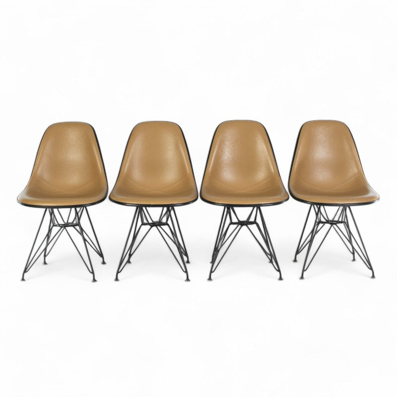 Front view of set of four beige Eames DSRs in a line