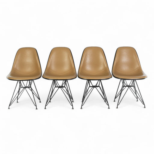 Front view of set of four beige Eames DSRs in a line