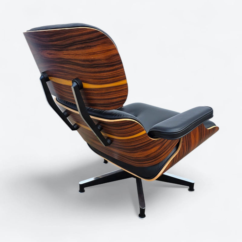 Rear angled view of black and santos Eames Lounge Chair