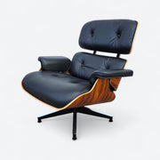 Right side angled front view of black and santos Eames Lounge Chair
