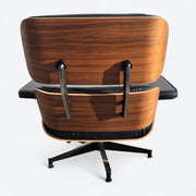 Rear view of black and walnut Eames Lounge Chair
