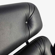 Artistic view of back rest cushion on black and walnut Eames Lounge Chair