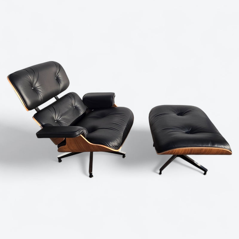 Top down right side view of black and walnut Eames Lounge Chair and Ottoman